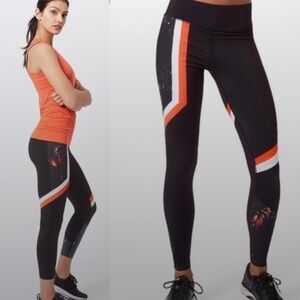 Sweaty Betty The Zero Gravity Leggings Black and Orange